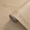 A close-up of a roll of self-adhesive wood-effect vinyl flooring in a light brown color. Anteprima dell’immagine prodotto
