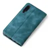 A teal flip cover case for a smartphone is shown against a white background. Produktbild-Vorschau