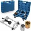 A set of automotive tools, including a bearing press and removal tool, laid out with their blue plastic carrying cases. Podgląd zdjęcia produktu