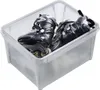 A pair of black rollerblades inside a clear plastic storage bin. Produktbild-Vorschau