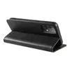 A black leather flip phone case for a Samsung Galaxy A52 is shown from the side, propped open. Produktbild-Vorschau