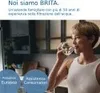 A woman is drinking water from a glass. Náhľad obrázku produktu