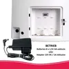 The back of a white electronic device showing a battery compartment and a power adapter. Anteprima dell’immagine prodotto