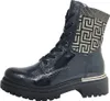 A black patent leather lace-up boot with a patterned knit cuff. Voir les images du produit
