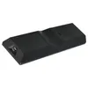 A black remote control on a white background. Produktbild-Vorschau