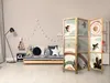 A child's bedroom with a daybed, a floor lamp, and a folding screen. Náhled obrázku produktu