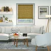 A living room scene with a sofa, coffee table, and a window with a bamboo blind. Produktbild-Vorschau