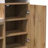 A close-up view of an open cabinet door of a wardrobe, revealing shelves and hinges. Produktbild-Vorschau
