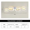A diagram showing the dimensions of a modern ceiling light fixture, with a table of specifications below. Voir les images du produit