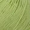 A close-up view of light green yarn. Podgląd zdjęcia produktu