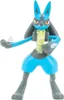 A toy figurine of the Pokémon character Lucario is shown standing against a white background. Anteprima dell’immagine prodotto