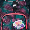 Close-up of a backpack with a floral pattern and a mermaid patch. Náhled obrázku produktu