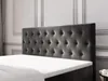 A close-up view of a tufted headboard of a bed, with a white mattress visible in the foreground. Produktbild-Vorschau