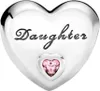A silver heart-shaped charm with the word "Daughter" engraved on it and a pink gemstone in the center. Podgląd zdjęcia produktu