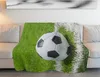 A soccer ball is placed on a blanket with a soccer field pattern, draped over a couch. Náhľad obrázku produktu