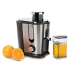 A Brabantia juicer with oranges and a glass of juice. Produktbild-Vorschau