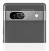 A close-up view of the camera module on the back of a smartphone, with protective films placed over the lenses. Produktbild-Vorschau