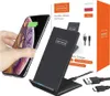 A hand is placing a smartphone on a black wireless charger, with the product packaging in the background. Produktbild-Vorschau