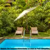 A poolside scene with lounge chairs and an umbrella, suggesting a relaxing outdoor environment. Anteprima dell’immagine prodotto