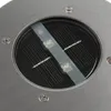A close-up view of a round, stainless steel solar ground light with visible solar panels and LED lights. Produktbild-Vorschau