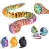 A collage of a segmented, articulated snake toy in various colors and poses, including one being held by a hand and another shown as an egg. Voir les images du produit