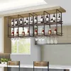 A wine rack with bottles and glasses hanging from it, mounted on a ceiling in a kitchen or dining area. Náhled obrázku produktu