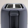 Close-up view of the top and front of a toaster. Produktbild-Vorschau