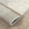 Close-up view of a rug corner on a wooden floor. Náhled obrázku produktu
