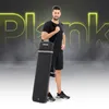 A man is standing and holding a folded fitness bench. The background has large, glowing text that says 'Plank'. Náhľad obrázku produktu