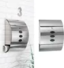 A collage of two images showing a stainless steel mailbox mounted on a white brick wall, with a house number '3' above it in one image. The other image shows the mailbox in isolation. Produktbild-Vorschau