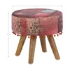 A round upholstered stool with a patchwork fabric cover and wooden legs, shown against a white background with measurement indicators. Produktbild-Vorschau