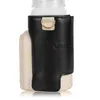 A close-up studio shot of a bottle warmer with a black leather-like cover and a beige base. Produktbild-Vorschau
