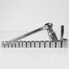 A set of socket wrenches and sockets arranged on a white surface. Produktbild-Vorschau