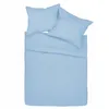 A top-down view of a light blue duvet and two pillows on a bed. Anteprima dell’immagine prodotto
