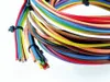 A bundle of colorful electrical wires coiled together. Produktbild-Vorschau