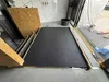 A newly laid resin floor with aggregate in a construction or renovation setting. Produktbild-Vorschau