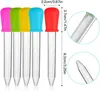 Multiple colorful droppers arranged side by side with measurement markings. Produktbild-Vorschau