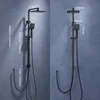 Two black shower systems are displayed against a blue textured background, with dimensions indicated by white lines and text. Produktbild-Vorschau