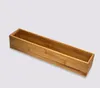 A wooden organizer box on a light gray background. Náhled obrázku produktu