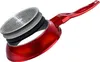 A cutaway view of a red frying pan, showing its layered construction. Náhled obrázku produktu