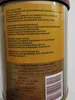 A close-up view of a tin can with product information and a barcode. Podgląd zdjęcia produktu