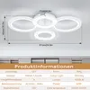 A modern LED ceiling light with multiple rings, shown against a plain ceiling. A table with product information is displayed below the light. Voir les images du produit