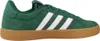 A side view of a green Adidas sneaker with white stripes and a brown sole. Produktbild-Vorschau