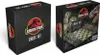 Two boxes of a Jurassic Park chess set are shown against a white background. The box on the left is closed and shows the front and side. The box on the right is open, revealing the chess board and pieces inside, with images of dinosaurs on the packaging. Podgląd zdjęcia produktu