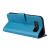 A blue flip cover phone case is shown from the side, open, with the phone inside. Produktbild-Vorschau