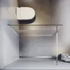 A top-down view of a modern bathroom with a toilet and a glass shower enclosure. Anteprima dell’immagine prodotto