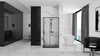 A modern bathroom with a shower cabin, bathtub, and a view from the window. Produktbild-Vorschau