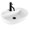 A white ceramic vessel sink with a black faucet and drain. Náhled obrázku produktu