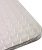 A close-up view of a corner of a rectangular table with a metallic, textured surface and a rounded edge. Produktbild-Vorschau