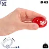 A hand holding a red lid with measurement indicators and weight information. Podgląd zdjęcia produktu